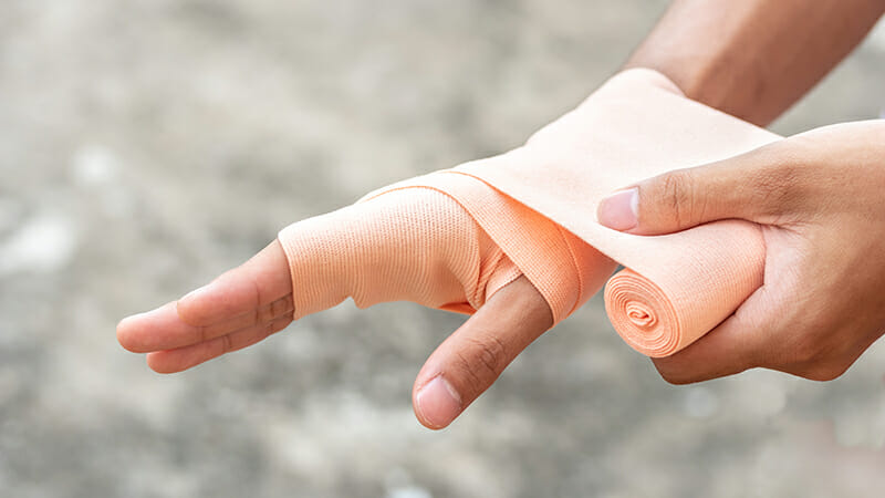 bandaged right hand